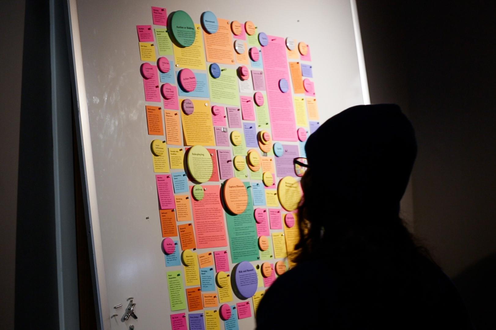 Student looking at bulletin board