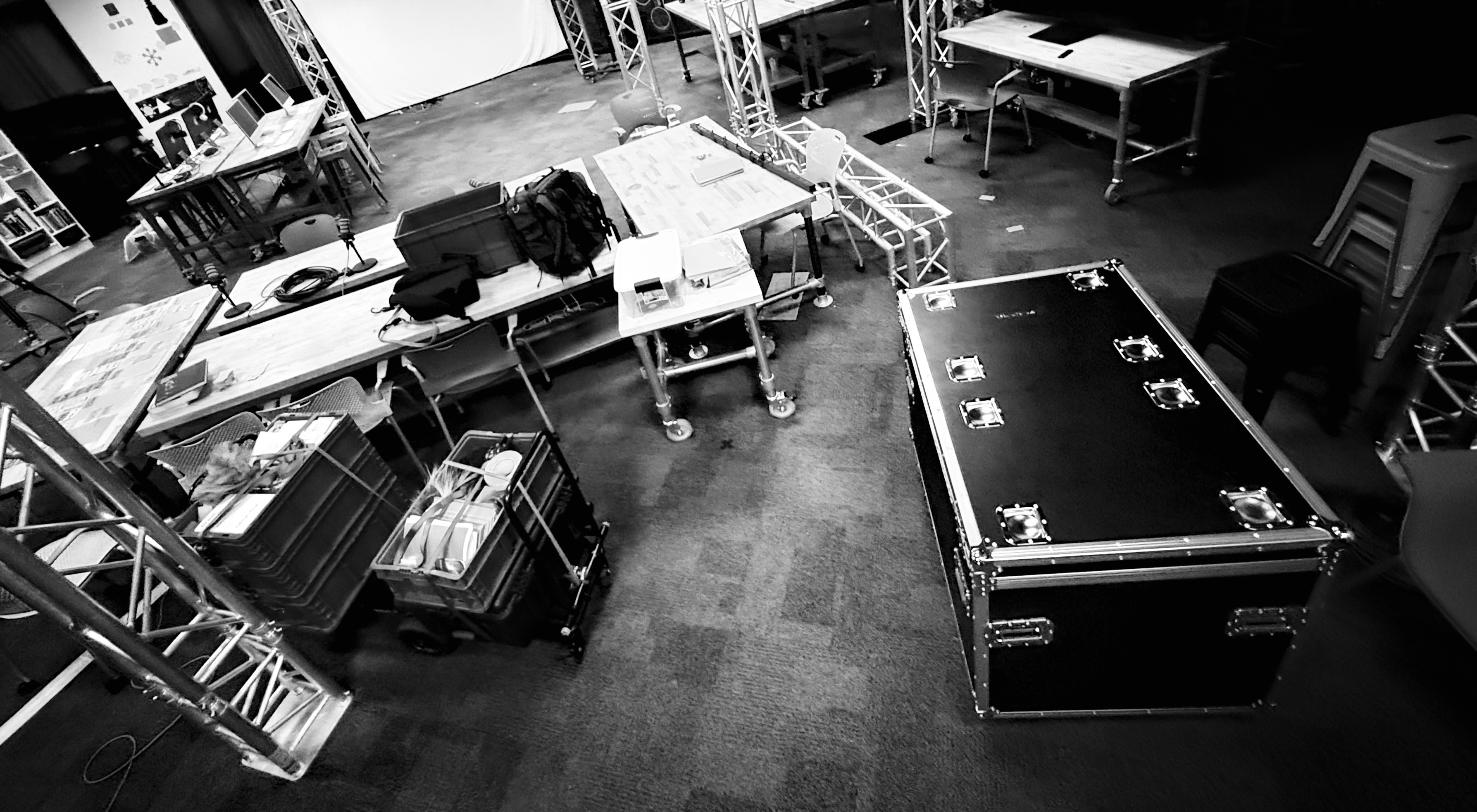 a black and white image of the truss and media equipment back inside of the Learning Lab studio